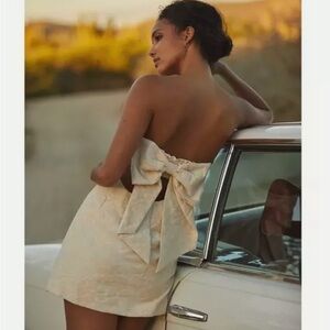 Anthropologie textured shift mini dress with bow detail